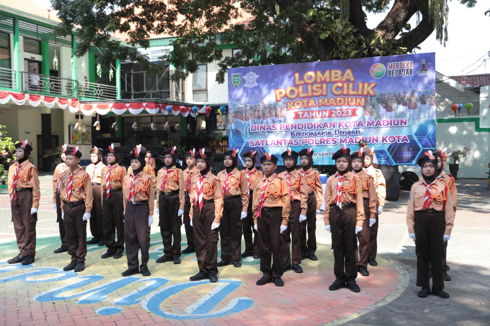 Foto 12 dari 13: Keluar Sebagai Juara Pertama, Regu Pocil dari Kartoharjo Berhak Maju Wakili Kota Madiun di Tingkat Provinsi