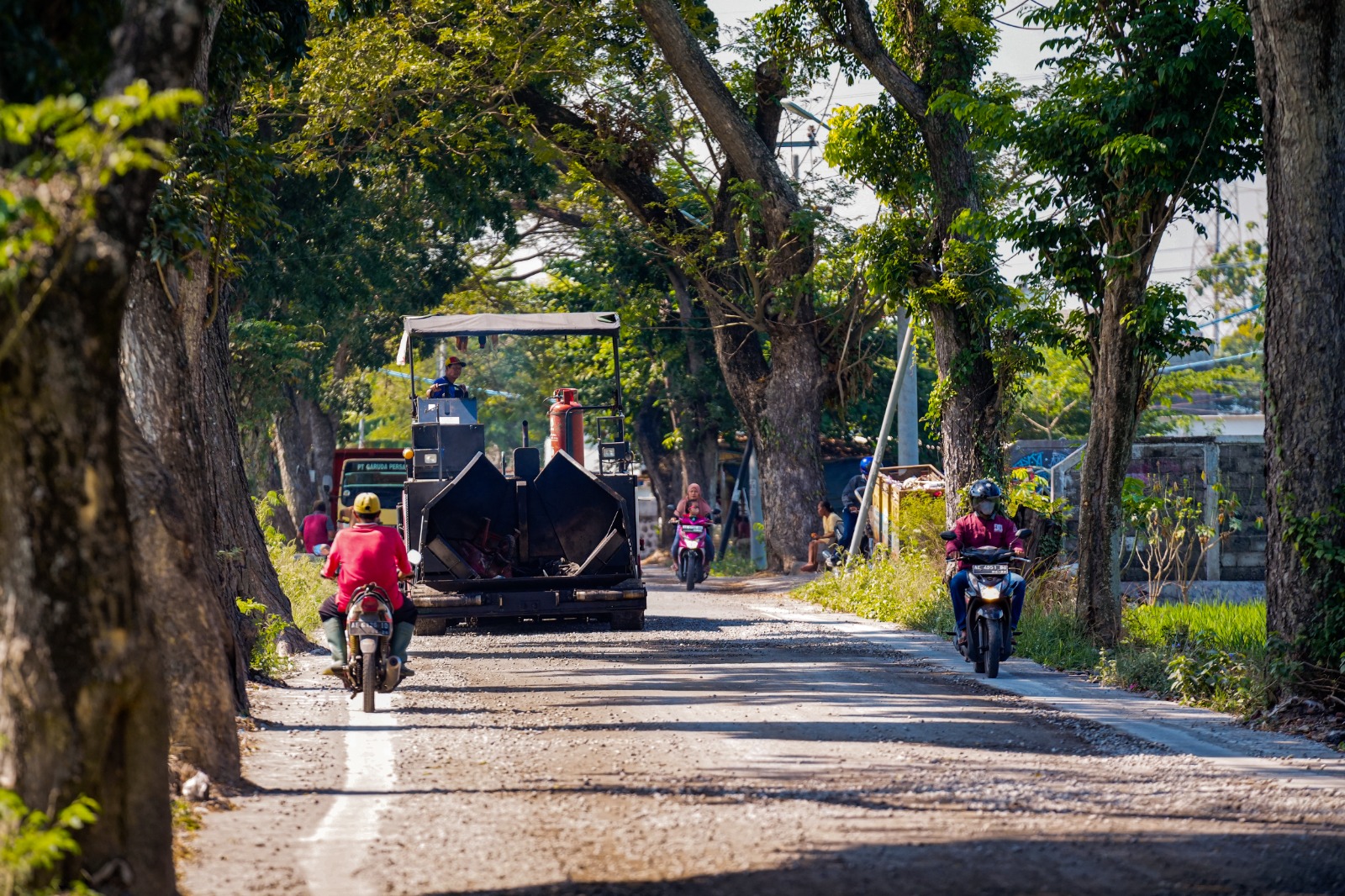 Foto 2 dari 2: Perawatan 35 Ruas Jalan di 2023 Nyaris Tuntas, Progres Pekerjaan Tembus 90 Persen