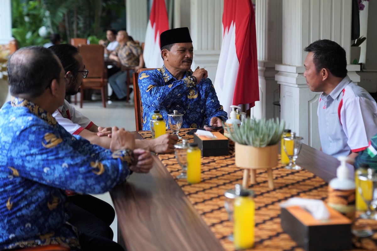 Foto 3 dari 6: Tambah Daya Tarik PSC, Djarum 76 Beri CSR VW Bermural