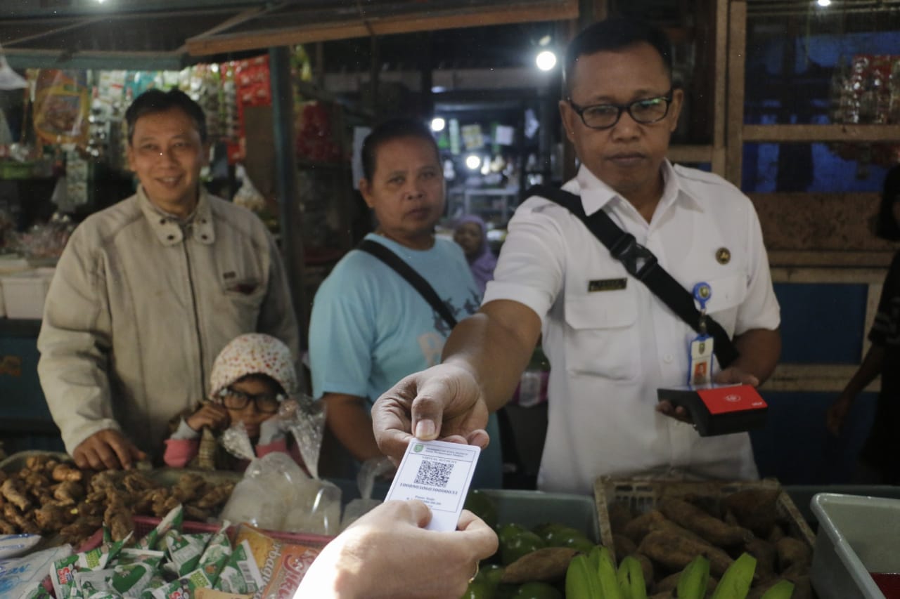Foto 1 dari 9: E-Retribusi Sudah Berlaku di 17 Pasar Tradisional di Kota Pendekar